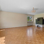 Freistehendes Einfamilienhaus mit Garten und Garage in familienfreundlicher Wohnlage von München