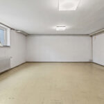 Freistehendes Einfamilienhaus mit Garten und Garage in familienfreundlicher Wohnlage von München