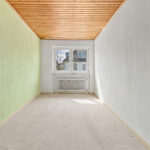 Freistehendes Einfamilienhaus mit Garten und Garage in familienfreundlicher Wohnlage von München