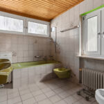 Freistehendes Einfamilienhaus mit Garten und Garage in familienfreundlicher Wohnlage von München