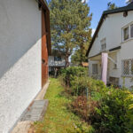 Freistehendes Einfamilienhaus mit Garten und Garage in familienfreundlicher Wohnlage von München