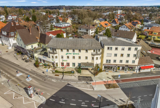 Investitionsmöglichkeit in Gauting: Wohn- und Geschäftshaus mit Hotel und Entwicklungspotenzial