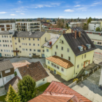 Investitionsmöglichkeit in Gauting: Wohn- und Geschäftshaus mit Hotel und Entwicklungspotenzial