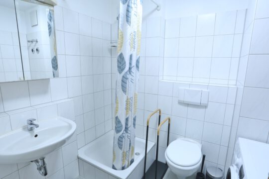 Vermietete 1,5-Zi. Wohnung mit Südbalkon und Garagenstellplatz in zentraler Lage von Leinf.-Echterd.