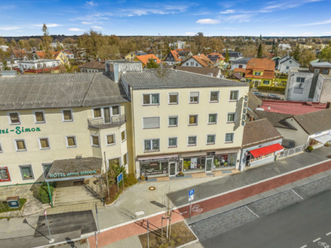 Investitionsmöglichkeit in Gauting: Wohn- und Geschäftshaus mit Hotel und Entwicklungspotenzial