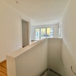 Erstbezug! Moderne Neubauwohnung auf zwei Etagen, mit Tiefgaragenstellplatz und eigenem Garten