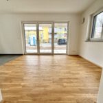 Erstbezug! Moderne Neubauwohnung auf zwei Etagen, mit Tiefgaragenstellplatz und eigenem Garten