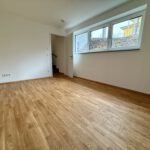 Erstbezug! Moderne Neubauwohnung auf zwei Etagen, mit Tiefgaragenstellplatz und eigenem Garten