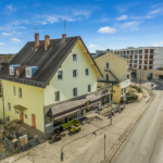 Investitionsmöglichkeit in Gauting: Wohn- und Geschäftshaus mit Hotel und Entwicklungspotenzial